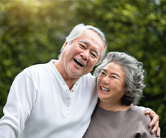 Senior man and woman smiling